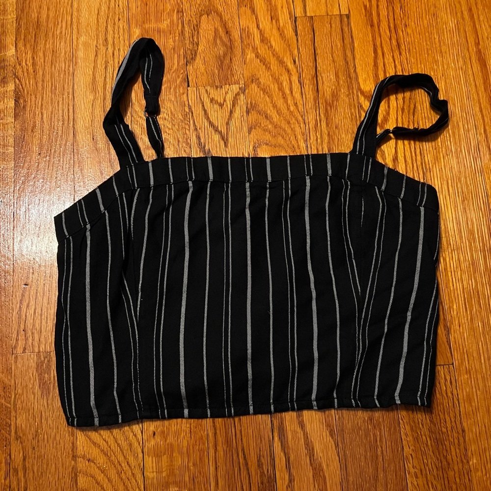 Navy blue cropped shirts with some white stripes size small.